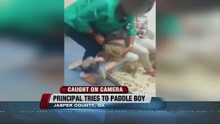 Principal tries to paddle student [upl. by Euqirdor]