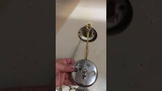 Installing trip lever plate and linkage assembly in bathtub [upl. by Teriann]