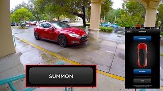 Tesla Model S Picks Owner up in the Rain using the new Summon Feature [upl. by Auqinimod]