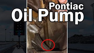 How to Install an Oil Pump on a Pontiac Engine [upl. by Yroffej]