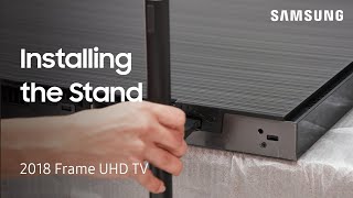 Install the Stand on Your 2018 Frame UHD TV  Samsung US [upl. by Anwahsar]