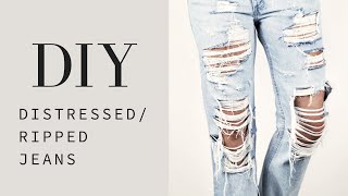 HOW TO  DIY Distressed  Ripped Jeans Tutorial [upl. by Aiclid]