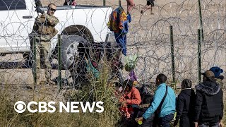 Spike in migrant crossings at USMexico border [upl. by Eletnahc229]