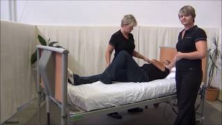 Rolling a Patient in Bed  Patient Manual Handling [upl. by Ahtibbat286]