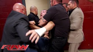 Security restrains a seething Dean Ambrose Raw Sept 22 2014 [upl. by Alolomo]