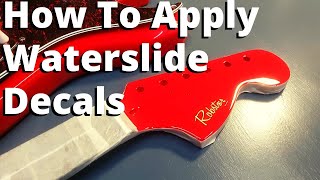 How To Apply Waterslide Decals To A Guitar Headstock Guitar Mods [upl. by Nyleaj]